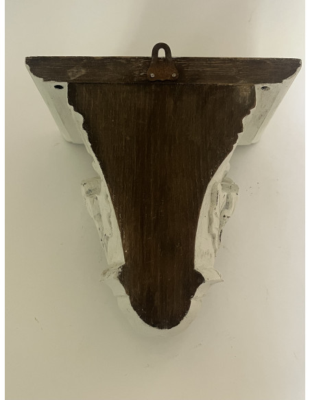 Socle mural en bois sculpté