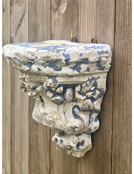 Console murale en plâtre sculpté